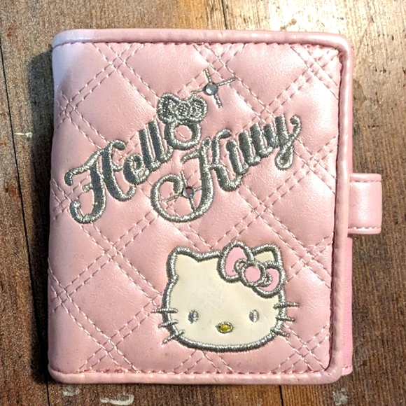 Sanrio Handbags - Hello Kitty bi-fold wallet